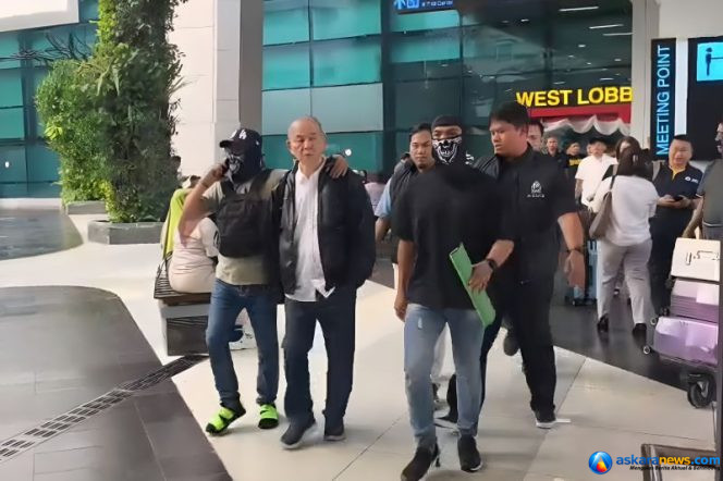 
 Keterangan : Yuwanky, Tersangka kasus peredaran gelap narkotika saat diringkus usai melarikan diri ke singapura